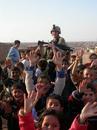 deadcantrant_com_shared_images_iraq.children_cheering_soldier.jpg