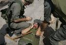 _snappedshot_com_uploads_Protests_capt.b6f8f54159894a2ca34f73e3cd46cb9a.mideast_israel_palestinians_barrier_jrl116.jpg