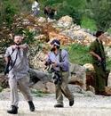 _imemc_org_attachments_jul2007_israeli_armed_settlers_attacking_palestinian_civilians_homes_in_hebron__file_2007_2.jpg