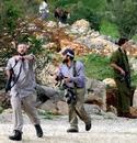 _imemc_org_attachments_may2008_israeli_armed_settlers_attacking_palestinian_civilians_homes_in_hebron__file_2007.jpg
