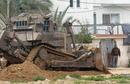 _imemc_org_attachments_apr2008_israeli_army_bulldozers_in_gaza__file_2007.jpg