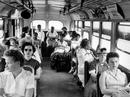 artfiles_art_com_5_p_LRG_26_2699_2JRUD00Z_stan-wayman-african-american-citizens-sitting-in-the-rear-of-the-bus-in-compliance-with-florida-segregation-law.jpg